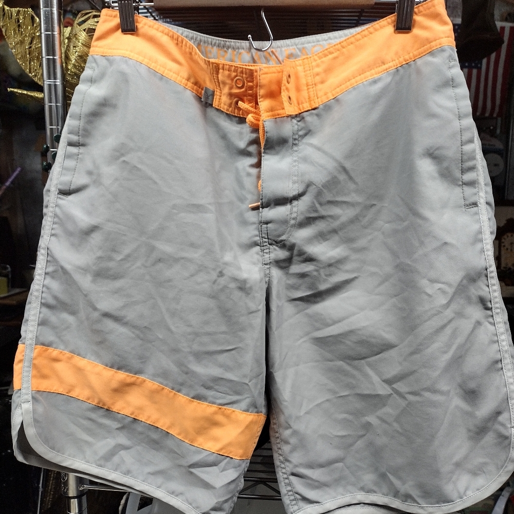 Medium size American eagle outfitters swim shorts gray and orange in color